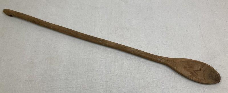 Large Wooden Ladle: Finely carved and shaped wooden ladle showcasing smooth contours and a rich natural patina from age and use. Measures approximately 32" H x 3" W x 1" D. In good condition with minor wear consistent wi
