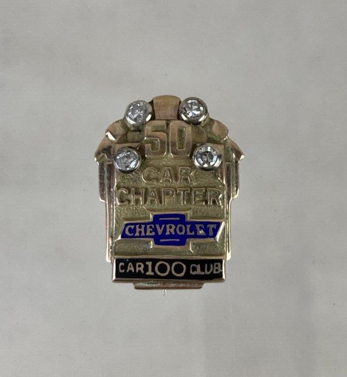 Chevrolet 100 Car Club “50 Car Chapter” 10K Gold Brooch Pin: Chevrolet 100 Car Club 50 Car Chapter brooch pin crafted in 10kt gold, marked 10K on the reverse, featuring the classic Chevrolet logo accented with enamel detailing and a clear faceted stone group at