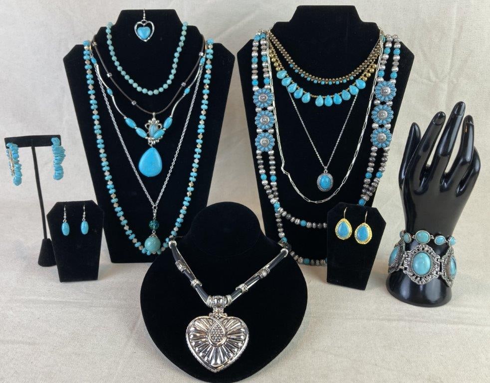 Grouping of Southwestern-Style Jewelry: A collection of southwestern-style turquoise colored jewelry in goldtones and silvertones including necklaces, bracelets, earrings, and more, all displaying classic regional design elements. Various s