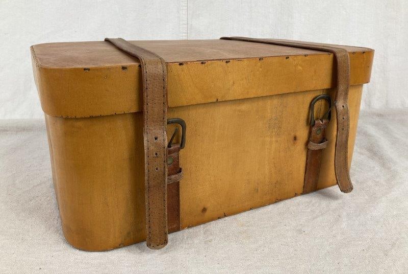 Vintage Bentwood Trunk: Rounded form trunk crafted from warm wood, featuring leather straps and a warm aged patina. Measures approximately 8'' H x 17 3/4'' W x 10 1/8'' D. Good condition with age-appropriate wear.
