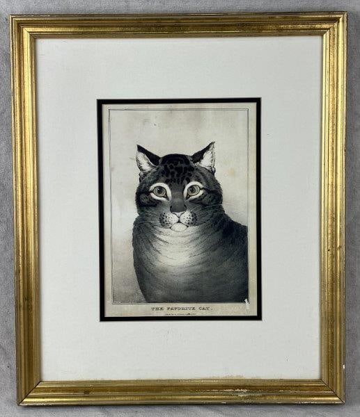 ''The Favorite Cat'' Print After Nathaniel Currier: A print after Nathaniel Currier's 19th-century lithograph The Favorite Cat, depicting a finely rendered gray tabby in characteristic Currier style. Presented in a gilt frame. The frame measures approx