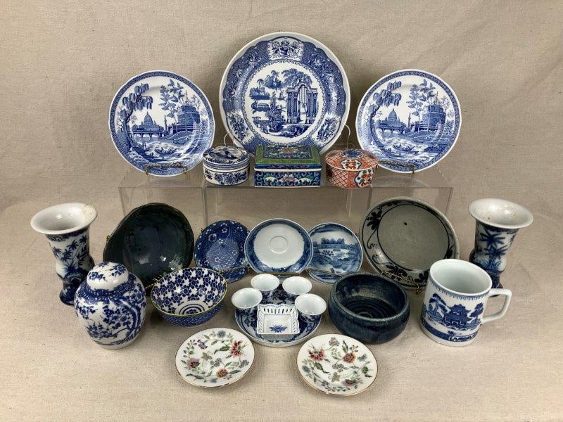 Large Collection of Blue and White Porcelain: A substantial assortment of blue and white porcelain featuring a pair of vases, a ginger jar, and various additional decorative pieces. The largest item measures approximately 10 1/2" H. Overall in go