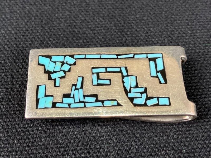 Taxco Sterling Silver Money Clip: Handsome sterling silver money clip featuring turquoise inlay and traditional Mexican design elements, marked 925 and Mexico with a T stamp on the reverse. Measures approximately 1 5/8" H x 5/8" W x 1