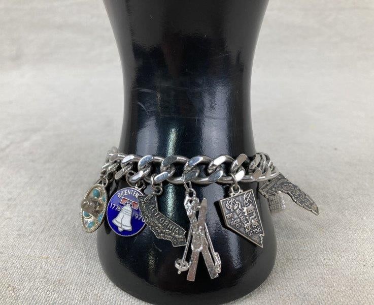 Monet Travel Silvertone Charm Bracelet with Sterling Silver Charms (1 of 11)