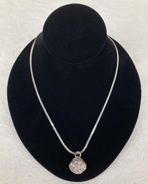 Artisan Sterling Silver Filigree Ball Pendant Necklace: Artisan-crafted sterling silver filigree ball pendant decorated with four cabochon stones—carnelian, onyx, moonstone, and malachite—set into an openwork spherical design. Paired with a com