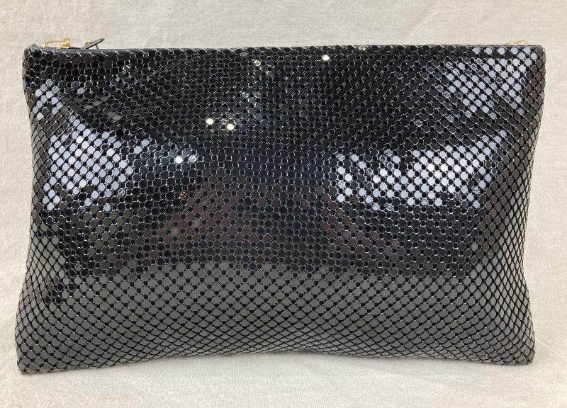 Lyrella Vintage Black Chainmail Mesh Evening Bag: Lyrella vintage evening bag featuring a sleek black chainmail mesh exterior with a coordinating metal strap, paired with a satin interior marked with the maker's logo. Measures approx. 7" H x 10 1/4" 