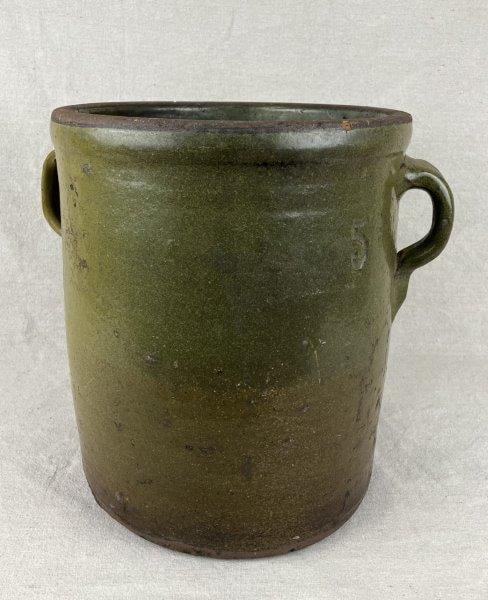 Southern Pottery Crock: A Southern pottery crock finished in a frogskin glaze, featuring straight-sided form with applied loop handles and an impressed “5” mark. Displays strong utilitarian character and traditio
