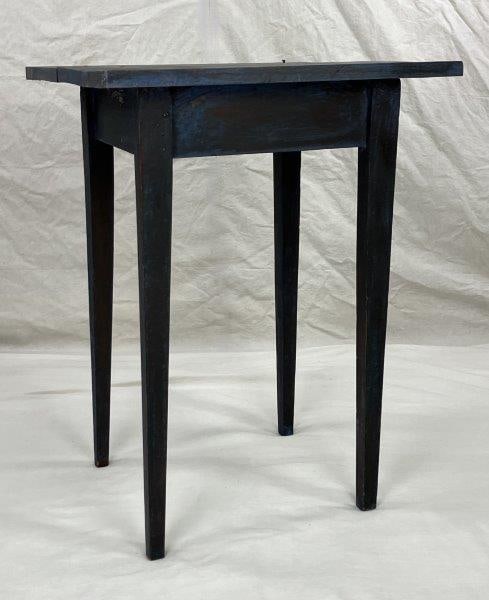 Blue Painted Country Table: A traditional country table featuring tapered legs and a classic, understated form, finished with a rich dark patina that highlights the blue painted wood tones. Measures approximately 29" H x 21 1/4"