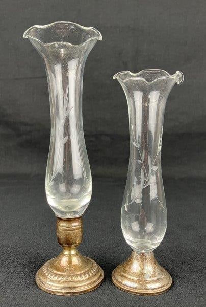 Etched Glass Bud Vases with Sterling Silver Bases: A pair of etched glass bud vases fitted with weighted sterling silver bases by Empire Silver Company. Each vase features a graceful flared lip and delicate floral etching, combining refined glasswork