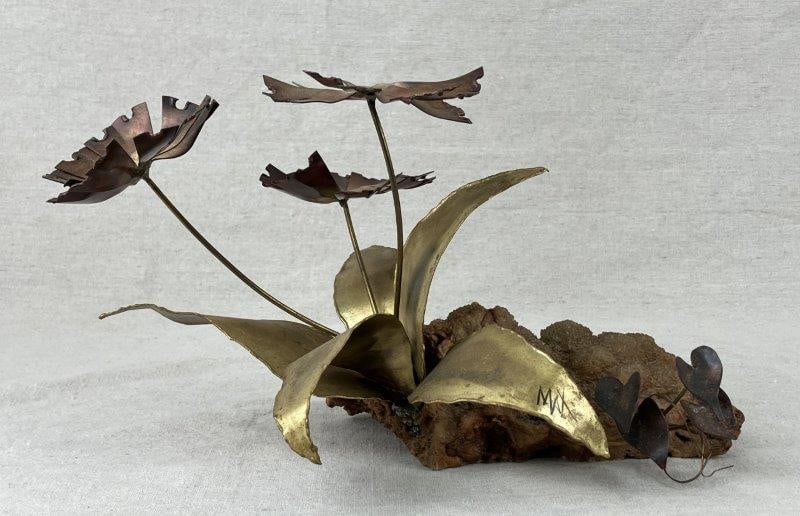 Mid-Century Modern Brutalist Mixed Metal Sculpture: A mid-century modern Brutalist mixed-metal sculpture featuring blooming floral forms mounted on a natural geode crystal base. Executed in brass and copper, the composition combines organic growth with