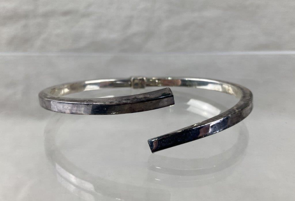 Dyadema Modernist Sterling Silver Bypass Cuff Bracelet: Dyadema modernist sterling silver cuff bracelet in a clamper-style bypass design, showcasing bold sculptural lines and a clean contemporary aesthetic. Marked 925 and Sterling on the interior.