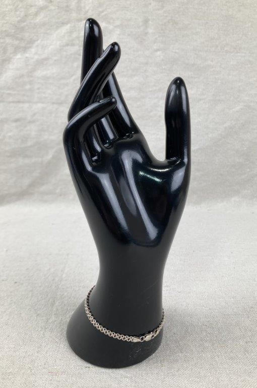 Three Sterling Silver Chain Bracelets - 12