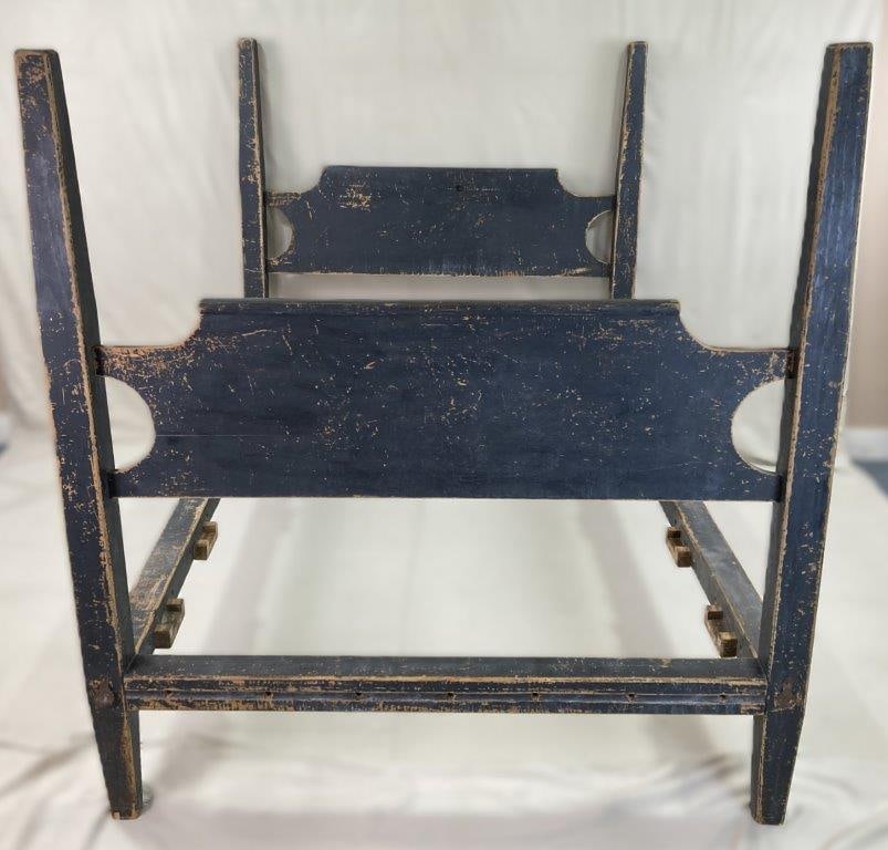 19th Century Blue Painted Country Bed: A solid pine country bed in queen size, finished in rich blue paint with traditional form and sturdy construction. Measures approximately 66″ H x 60 3/4″ W x 77″ D. Shows general