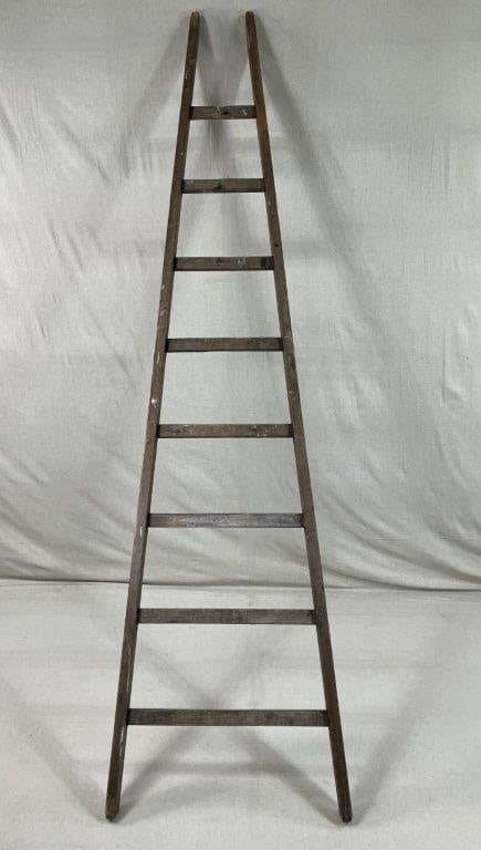 Antique Apple Orchard Ladder: A rustic antique apple picking ladder of solid pinewood construction, retaining a rich, timeworn patina that reflects years of agricultural use. The tall, tapered form embodies classic orchard