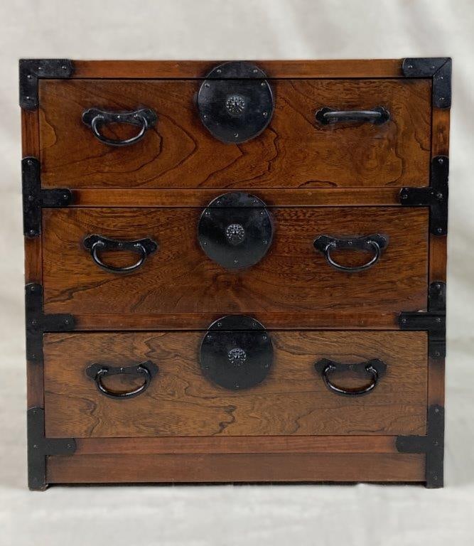 Korean Rosewood Chest: A small Korean rosewood chest with a three-drawer configuration and a handsome, rich finish. Measures approximately 23″ H x 22 1/2″ W x 15″ D. In good condition with light wear to