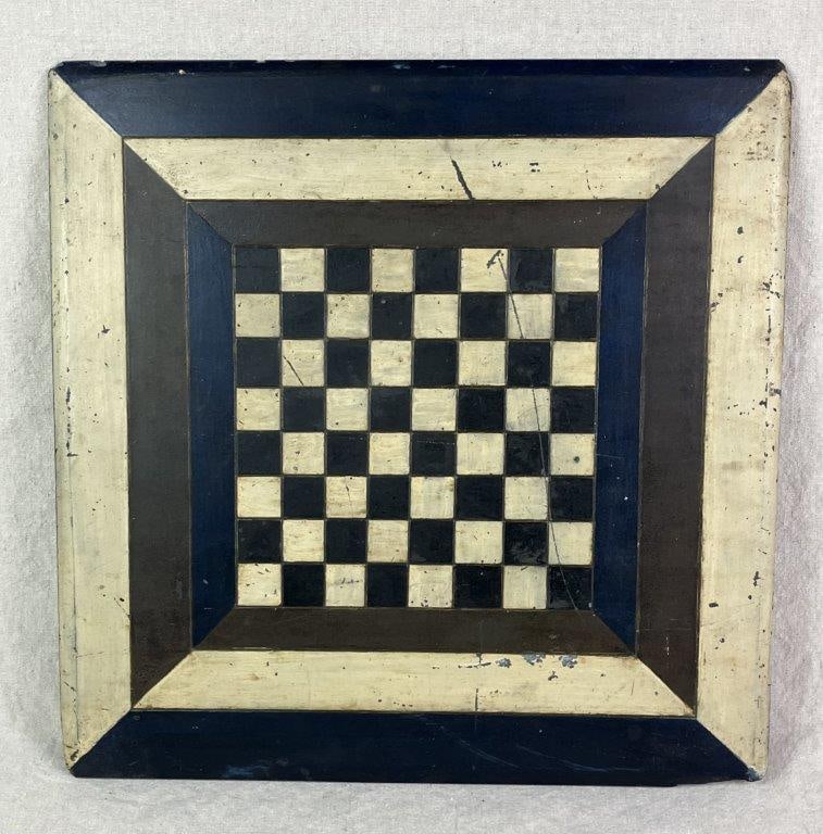 Folk Art Polychromed Chessboard: A substantial and weighty slate chess board decorated in polychrome tones, presenting a bold grid pattern with strong visual contrast. The solid construction and hand-finished surface lend