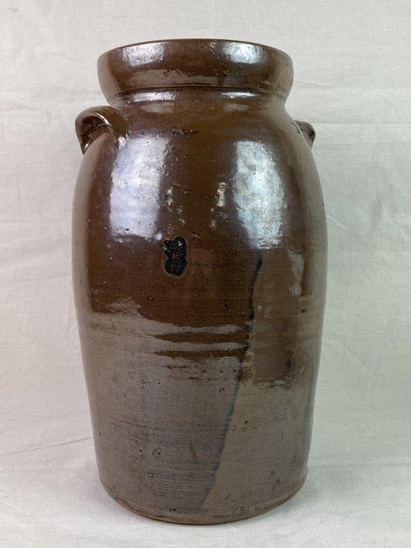 Antique Stoneware Churn: A five-gallon brown-glazed stoneware churn of ovoid form with a flared rim and applied handles. Marked with the number “5” to both the side and the lid. Exhibits a worn, mellowed patina