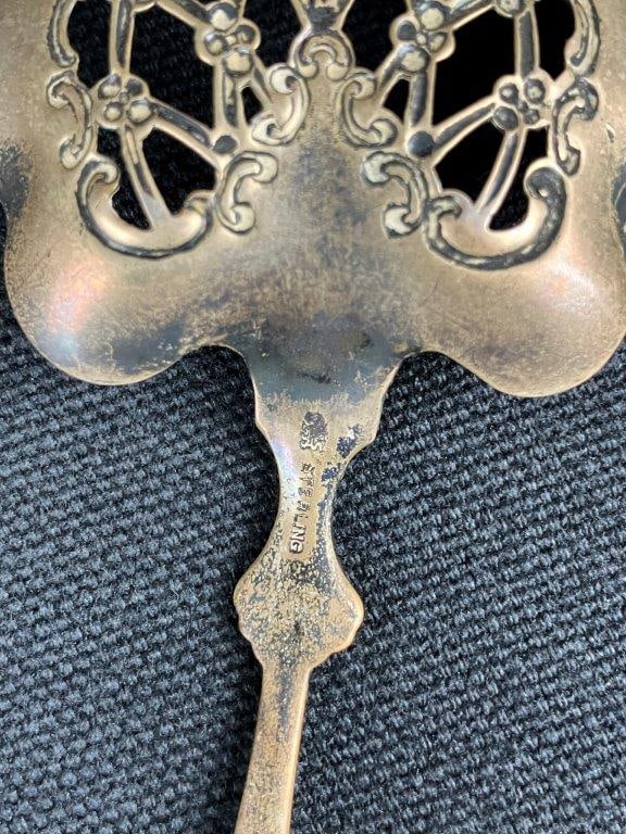 Three Sterling Silver Pierced Spoons - 8