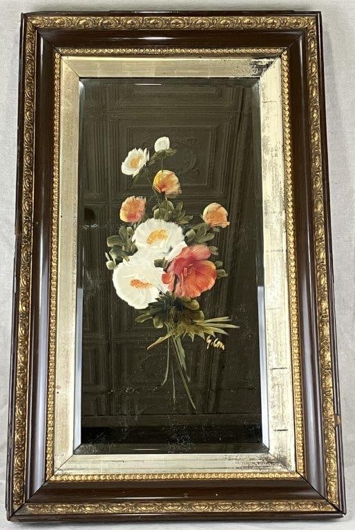 19th Century English Painted Mirror: An expertly executed painted mirror featuring floral decoration with confident brushwork, signed by the artist. Set within an ornate frame incorporating a silver-tone liner and gilt decorative