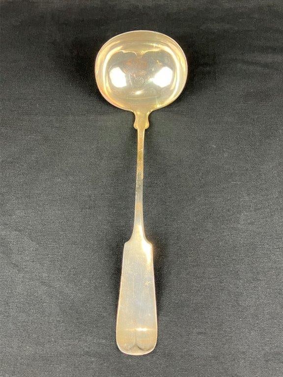 Coin Silver Ladle: A coin silver ladle bearing the “C & R” hallmark, presenting a simple yet elegant form with restrained design. Measures approximately 12 1/2″ H x 4″ W x 3 1/4″ D. Shows