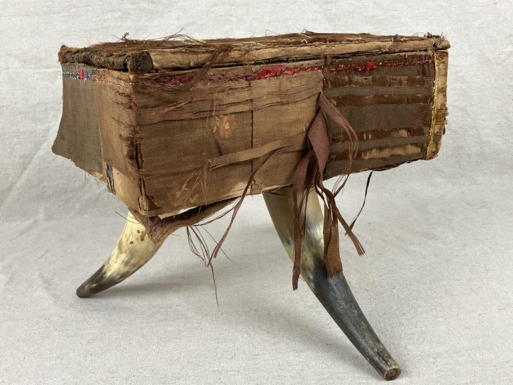 Folk Art Trinket Box: An antique folk art trinket box wrapped in sewn fabric, featuring a charming sewn dog figure mounted to the lid. The interior displays a Horicon Poultry Yards advertisement and a