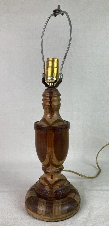 Mid-Century Modern Wood Table Lamp Bases: A turned wood Mid-Century Modern table lamp base with two-tone coloration, featuring stacked curved sections and a round base. Displays a warm, mellowed patina. Measures approximately