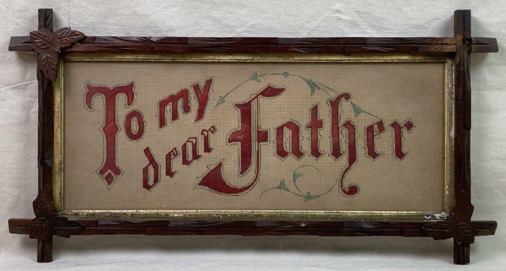 Victorian Needlepoint Punch Paper Motto: A Victorian punched paper needlepoint motto worked in red thread reading â€œTo My Dear Father,â€ framed by green-thread foliate decoration. Housed in a crisscross