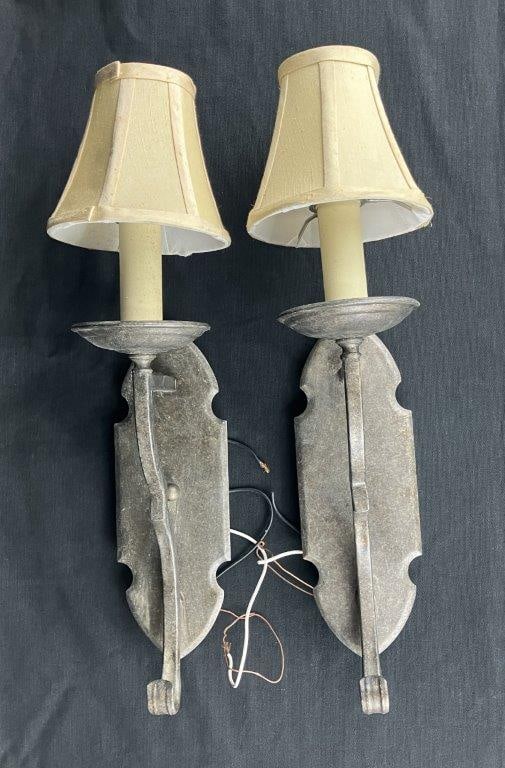 Brushed Metal Wall Sconces: A pair of wall sconces in a soft silvertone brushed metal finish, fitted with fabric shades. Each sconce measures approximately 19 5/8â€³ H x 4â€³ W x 5 1/4â€