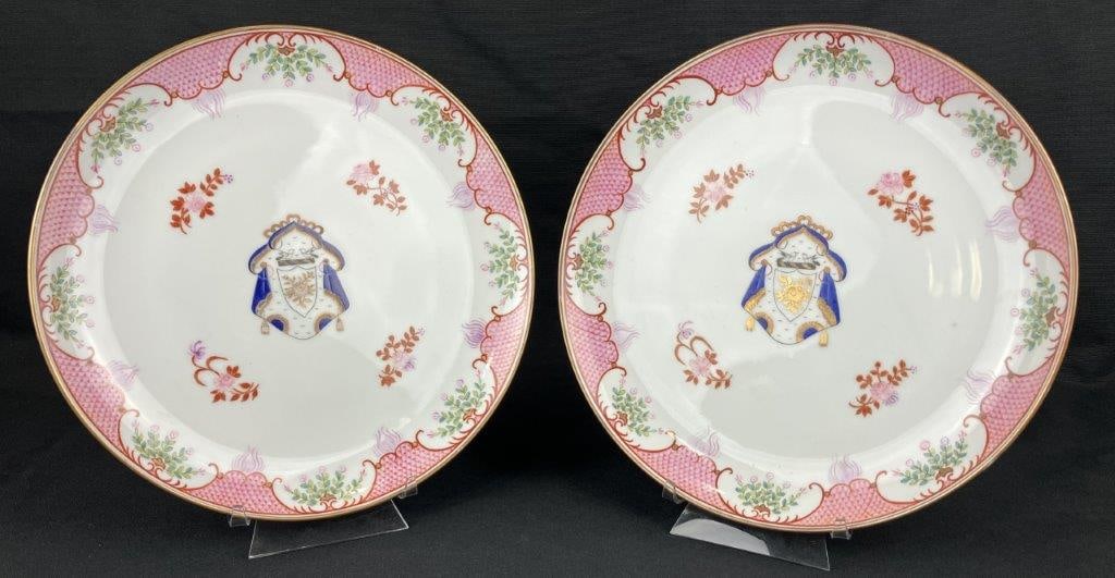Chinese Export Armorial Porcelain Plate Pair: A pair of Chinese export armorial porcelain plates in the famille rose palette, a decorative style popularized in the 18th century. Decorated in pleasing pink and blue tones with finely painted