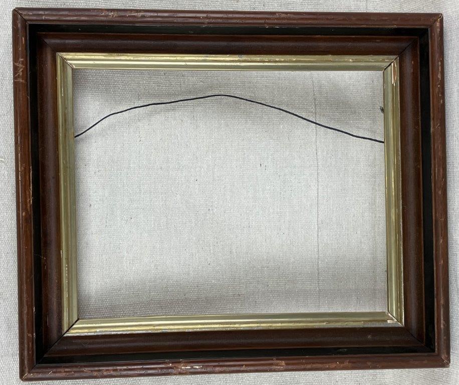 Mahogany Gilt-Lined Frame: An antique mahogany frame with simple, clean lines, featuring a deep, patinated mahogany surface accented by a gilt liner. Presents a restrained, classic form suitable for a variety of artworks.