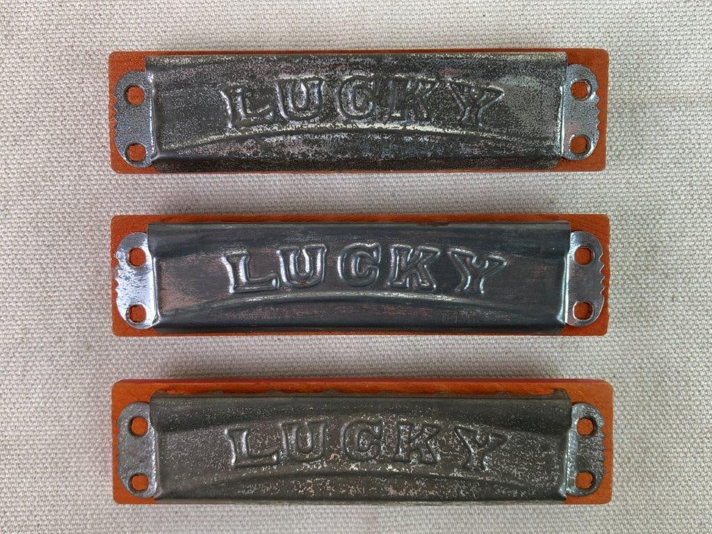 Three Vintage Lucky Harmonicas - 3