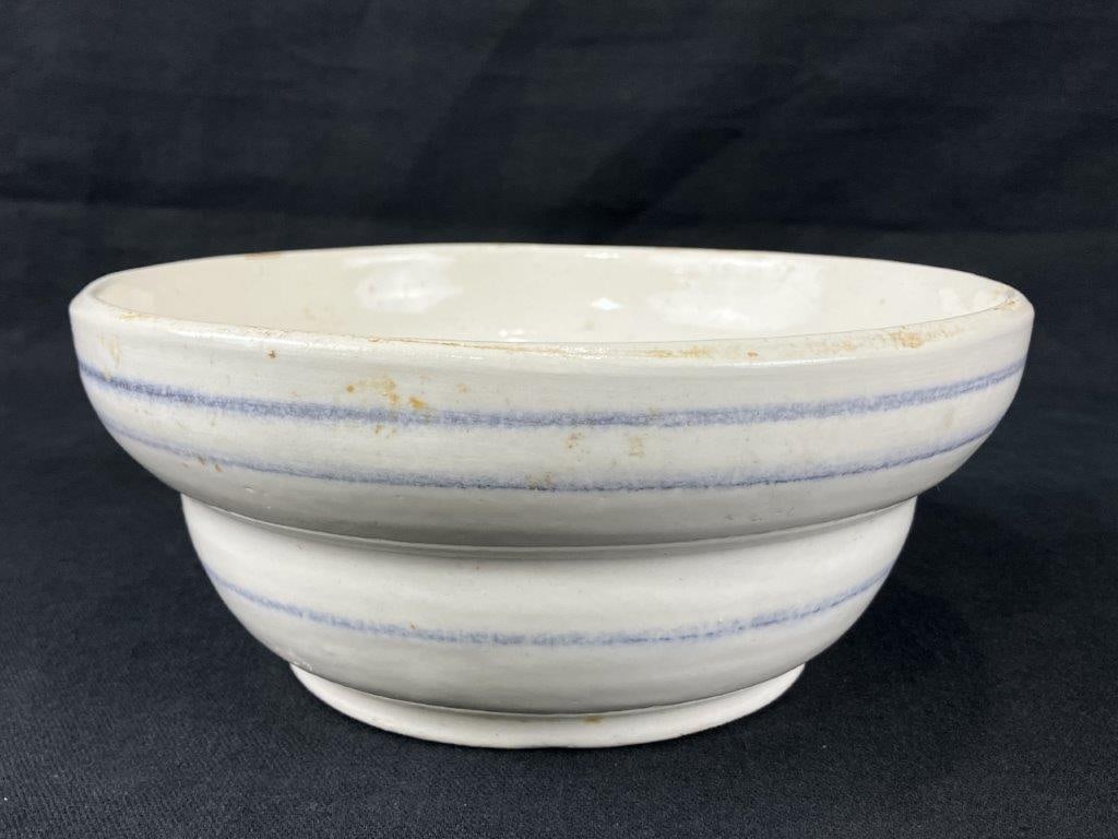 Mountainside Pottery Stoneware Mixing Bowl: A stoneware mixing bowl attributed to Mountainside Pottery, finished with a creamy glaze accented by cobalt blue bands around the form. Bears a distinctive â€œMPâ€ mar
