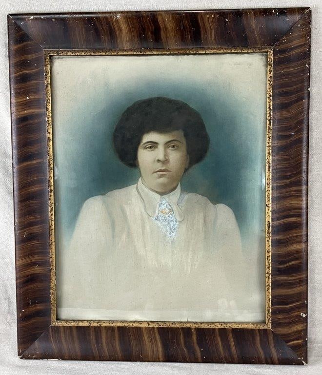 Early 20th Century Hand-Painted Photograph Portrait of a Woman: An early 20th century photograph portrait of a woman, artistically enhanced with applied color and hand-drawn detailing to the face and clothing. The sitter is depicted with a traditional Edwardian co