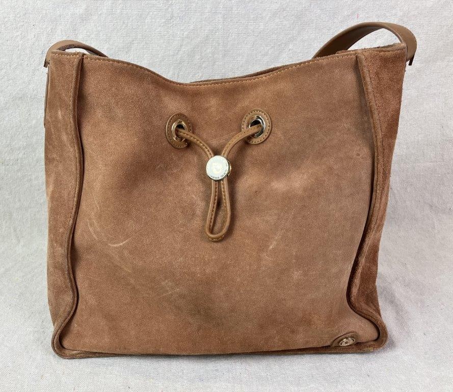 Spartina 449 Harper Hobo Bag: Spartina 449 Harper Hobo shoulder bag rendered in the rich Gingerbread colorway, featuring a soft suede exterior accented with leather trim. Designed with a drawstring toggle closure secured by a