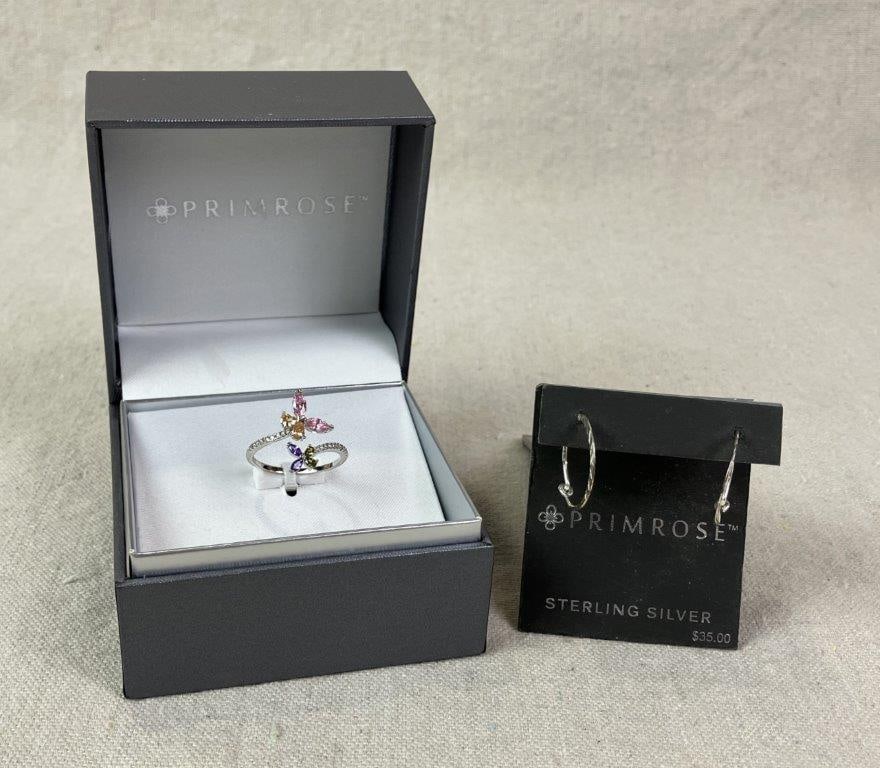 Primrose Sterling Silver Hoop Earrings and Butterfly Ring Set: Primrose brand sterling silver set including one pair of elegantly formed hoop earrings and a coordinating butterfly design ring accented with a multitude of multicolored faceted stones and a slim