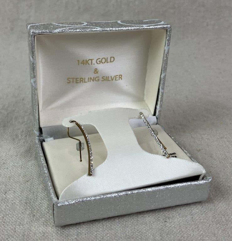 Crystal-Decorated Sterling Silver and Gold Vermeil Threader Earrings: Threader-style earrings crafted in gold vermeil over sterling silver, accented with sparkling Swarovski crystals in a delicate linear form. Each measures approx. 1 1/2" H x less than 1/8" W. Total