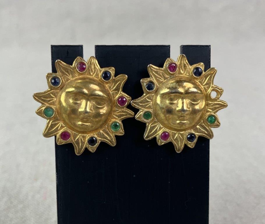 Vintage Jaded Sun Face Earrings: Vintage goldtone stud earrings designed as sculptural sun faces in relief, each encircled by a halo of multicolored faceted stones adding vibrant contrast and dimension. Jaded brand logo on reverse.