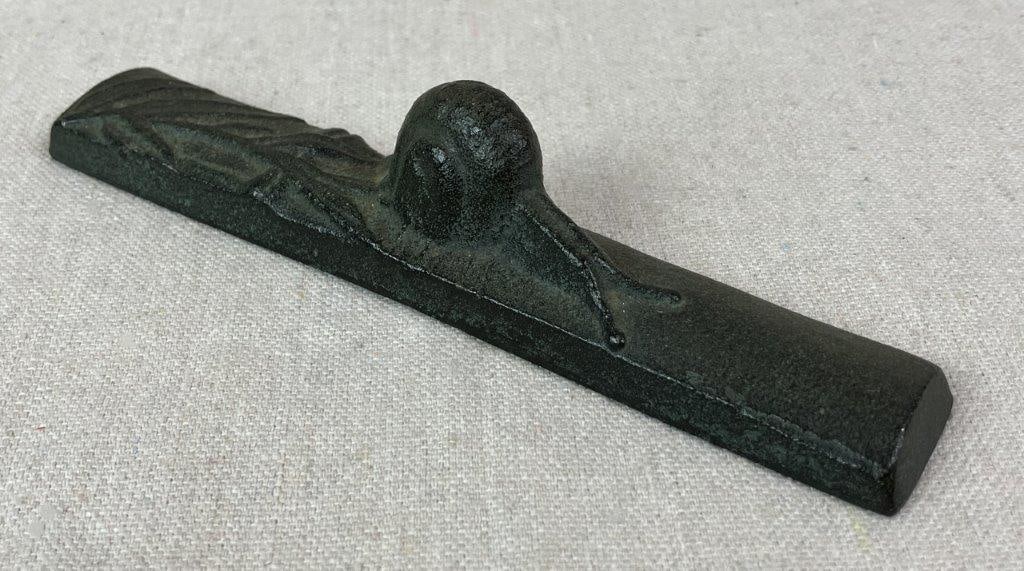 Cast Iron Snail Paperweight: Cast iron sculptural paperweight depicting a snail nestled among blades of grass, rendered in a compact and decorative form ideal for desk or shelf display. Measures approx. 1 1/4" H x 5 7/8" W x 1" D