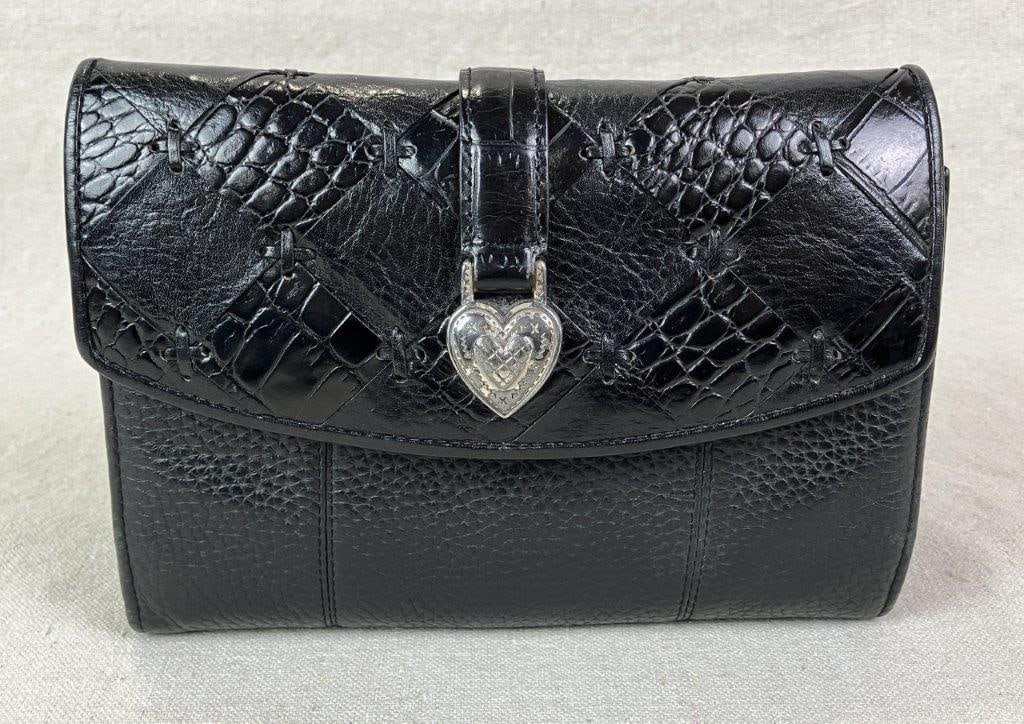 Brighton Black Leather Crossbody Bag or Wallet: Brighton crossbody bag with integrated wallet-style organization, crafted in supple black pebbled leather and accented with silvertone hardware and a central heart adornment to the front closure.