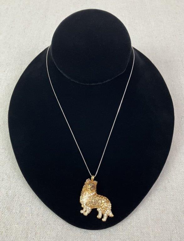 Vintage Sterling Silver and Gold Vermeil Dog Pendant: Vintage sterling silver pendant and chain, both marked for silver content, featuring a charming collie, Sheltie, or herding dog motif encrusted with rhinestones and enamel, finished with gold vermeil