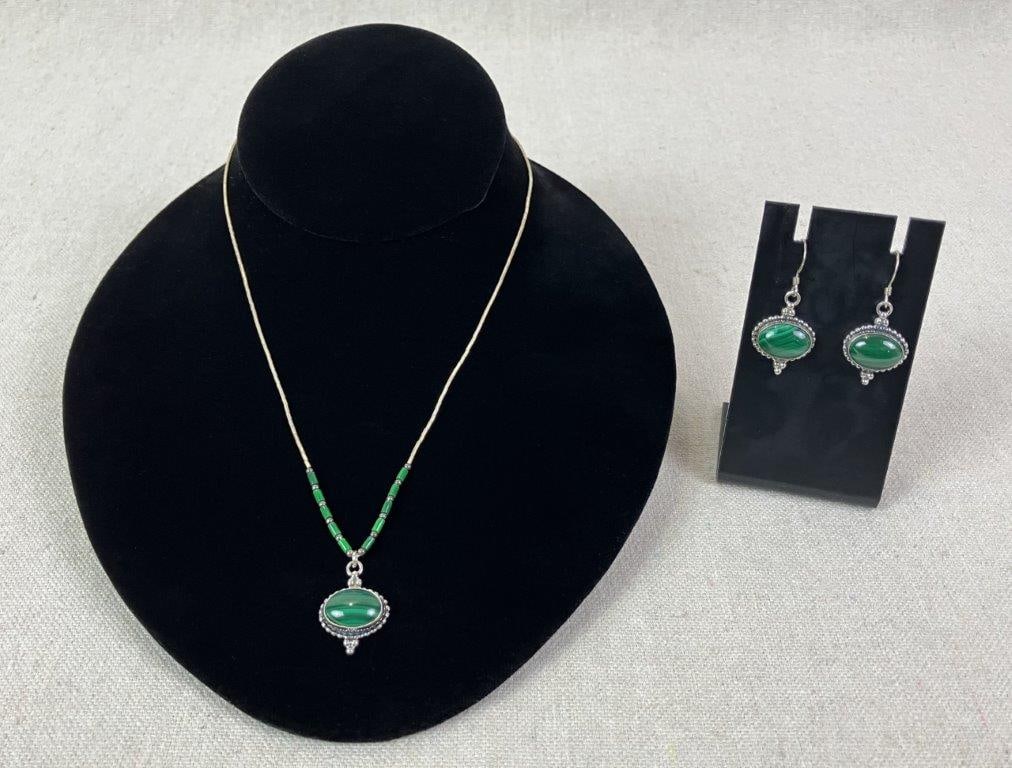 Sterling Silver and Malachite Demi-Parure: Elegant artisan-crafted style earring and necklace set featuring polished malachite cabochons framed by beaded sterling silver borders. Necklace suspended from a chain accented with elongated silver