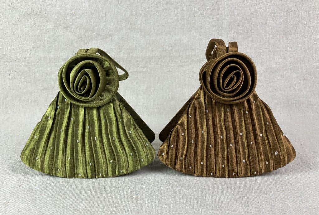 Pair of Fan-Shaped Satin Evening Bags: Pair of elegant evening wristlets in pleated fan form, each gathered and adorned with a coiled rose accent near the straps and finished with decorative beading. One rendered in warm gold-bronze tones