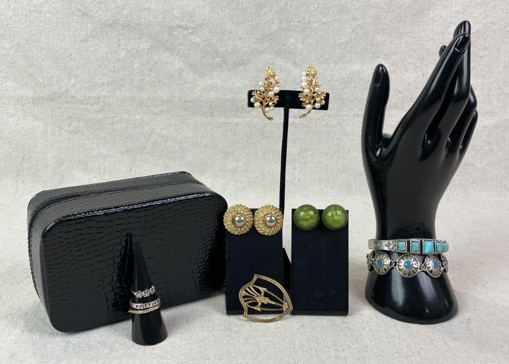 Jewelry with Black Crocodile-Pattern Vinyl Travel Jewelry Box: Travel jewelry box in black vinyl with crocodile pattern exterior and zippered closure, opening to a purple lavender fabric interior with gold tone maker's "R" emblem. Includes assorted vintage