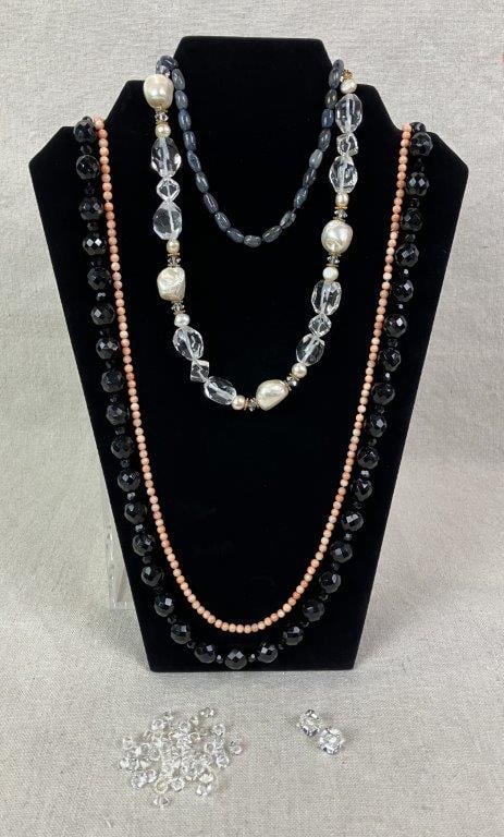 Collection of Beads Including Jet Necklace and Coral Strand: Group comprising a strand of crystal and faux pearls with gold-tone spacers and smaller freshwater pearl accents, a strand of polished pink coral beads, a faceted jet bead necklace, one strand of labr