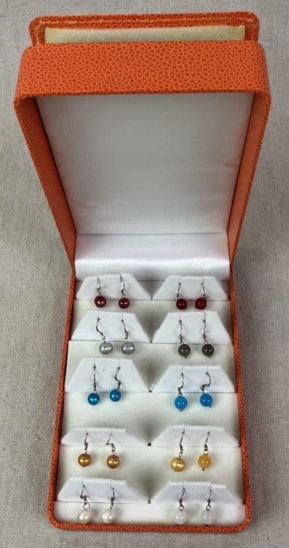 Collection of Pearl and Bead Earrings: Group of nine pairs of polished sphere dangle earrings together with two unmatched examples. Five pairs feature dyed freshwater pearls in assorted colors including orange, blue, silver, and red.