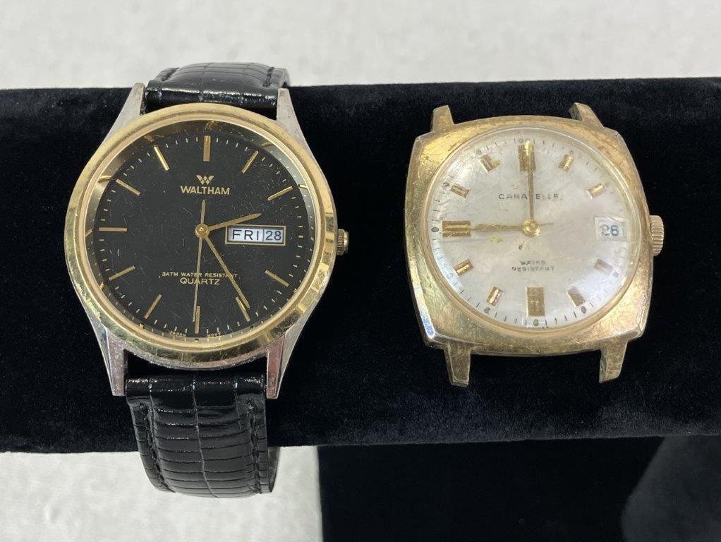 Two Vintage Men's Wristwatches: Group of two men's wristwatches including a Waltham XB810 featuring a silver-tone case with gold-tone bezel, quartz movement, and black leather wristband, together with a Caravelle wristwatch body in
