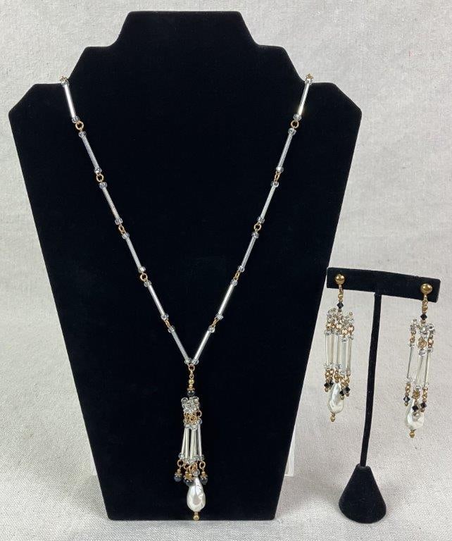 Faux Pearl and Bead Necklace and Earring Demi-Parure: Coordinated demi-parure set comprising a necklace and matching earrings, featuring a central teardrop-form faux pearl accented by long clear beads, black beads, and circular clear beads with goldtone