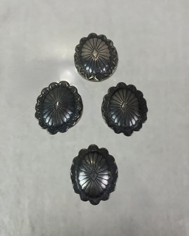 Sterling Silver Native American Concho Button Covers: Group of four Native American concho-style button covers featuring raised sunburst motifs, tested for sterling silver content. One measures approx. 3/4" H x 3/4" W. Total weight approx. 14.10g. In