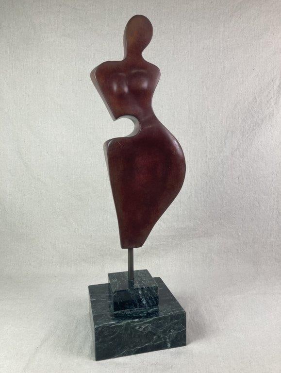 Amati Maiden Bronze Sculpture by Theo Sable: An elegant and abstract bronze sculpture titled Amati Maiden, rendering the female form through a series of fluid, biomorphic curves reduced to an essential silhouette. The figure features a warm