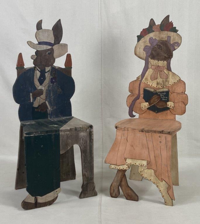Pair of Folk Art Painted Rabbit Chairs: A whimsical and uniquely hand-crafted duo featuring tall, figural backs meticulously carved and polychromed to represent a male and female rabbit, capturing a playful storybook aesthetic likely